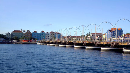 Willemstad, Curacao Dutch Antilles -  November 2019: Queen Emma floating bridge with Otrobanda in the background.