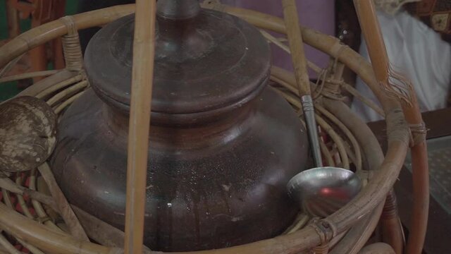 jug made of clay, filled with typical Indonesian dawet ice. Usually served at weddings for invited guests.