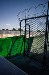 Fence and barb wire