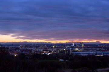 Panorama of downtown Munich during a cloudy autumn season sunset.