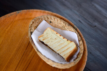 Delicious toast in a basket on the table. Delicious breakfast concept in the morning
