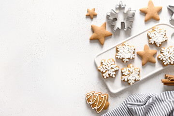 Obraz na płótnie Canvas Christmas homemade glazed cookies on white background. View from above. Flat lay. Space for text.