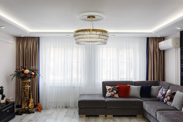 Modern living room with a chic chandelier