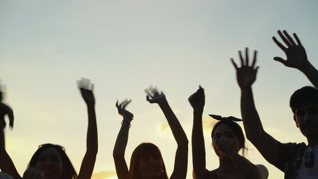 silhouette people party dancing recreation a music concert pull their hands up holiday
