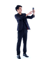 Handsome young man taking a selfie