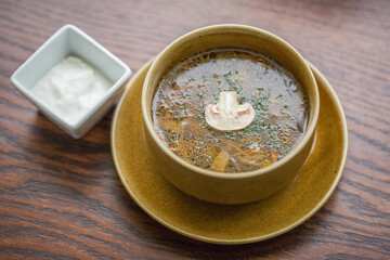 rich mushroom soup with vegetables and herbs