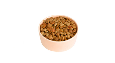 Pink bowl full of pet food isolated on a white background. Pieces of food of different shapes. copy space.