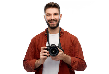 photography, profession and people and concept - happy smiling man or photographer with digital camera over white background