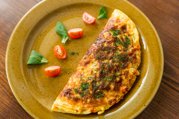 baked pie with cheese and cherry tomatoes