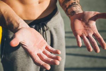 Hands with callus of a young calisthenics sportman