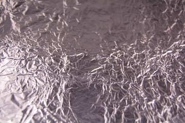 Silver foil for the background of your design. Background and texture concept.