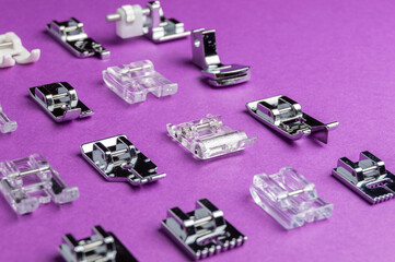 Presser foot for sewing machines. Universal feet for sewing clothes at home from different materials on a household typewriter. Feet for sewing different materials.  Individual tailoring