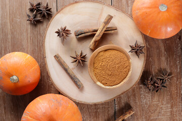 Labu kabocha. Ripe pumpkin, sliced pumpkin, pumpkin on the old board background