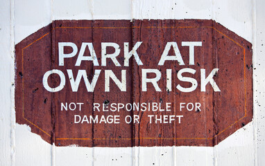 Park at Own Risk sign