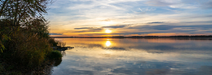 Fototapeta na wymiar Sunset at the Cospudener Lake in Leipzig