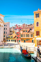 Summer in Venice, Italy. View of old buildings, narrow streets and bridges. Monuments of one of the most beautiful cities in Italy.