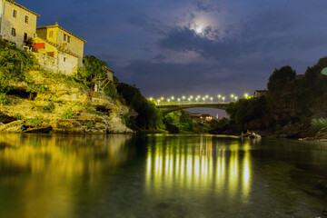 Fototapeta na wymiar Night view of the Port Bridge in Mostar. Bosnia and Herzegovina