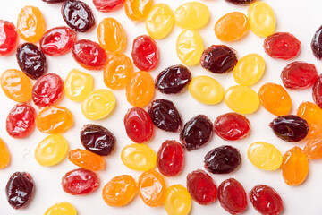 Top view photo of caramel colorful sweets background.