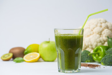 Detox cocktail from raw green fruits and vegetables and lettuce and parsley