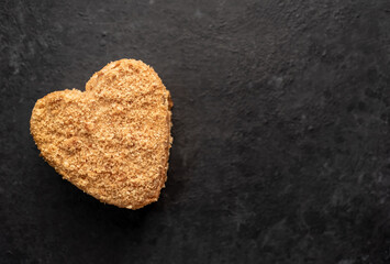 heart shaped cake on stone background