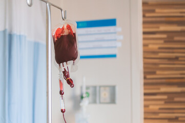 Blood transfusion in medicine patient in hospital.