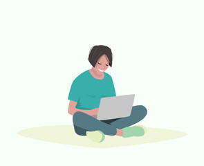 Fototapeta na wymiar Woman sitting on the floor with laptop.
