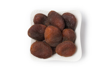 Dried apricots isolated on white in studio 