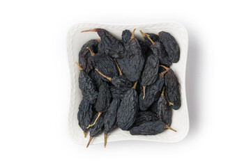 Dried fruits, raisins on white background