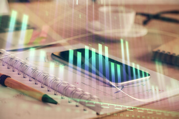 Double exposure of forex chart drawing and cell phone background. Concept of financial data analysis