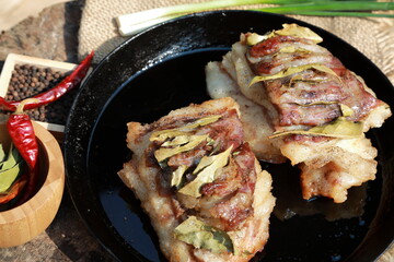 baked meat with specialties in the oven