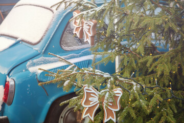 Fragments of a Christmas tree and a vintage car