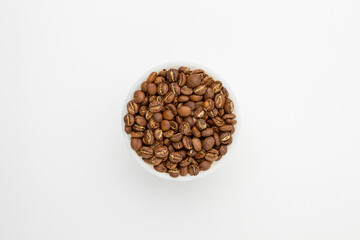 Specialty light roasting coffee beans from Kenya on a white background