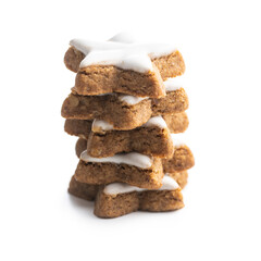 Icing gingerbread stars. Traditional Christmas cookies.