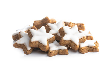 Icing gingerbread stars. Traditional Christmas cookies.