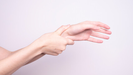 Parkinson's disease symptoms. Close up of tremor (shaking) hands of Middle-aged women patient with Parkinson's disease. Mental health and neurological disorders.