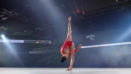 Foto op Plexiglas anti-reflex Rhythmic gymnast in professional arena. © VIAR PRO studio