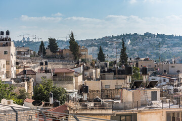 Fototapeta na wymiar Residential houses at the Mount of Olive and Kidron Valley in Jerusalem, Israel