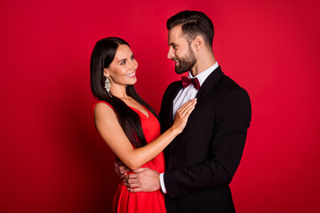 Profile photo of optimistic cool couple hug look wear suit dress isolated on red color background