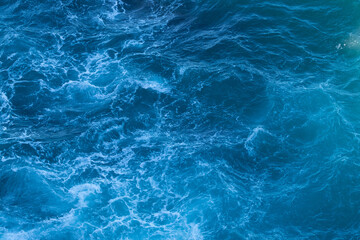 Fototapeta na wymiar Wild and power of the ocean, foamy water, waves.