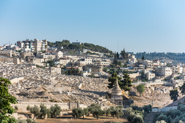 Jewish graveyard with the Tomb of Absalom at the Kidron Valley or King's Velley between Temple Mount and Mount of Olives in eastern Jerusalem.