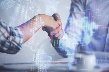 Double exposure of forex graph hologram and handshake of two men. Stock market concept.