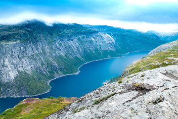 Fototapeta na wymiar Ringedalsvatnet lake near Trolltunga in Norway, Ringedalsvatnet - blue lake in the municipality of Odda in Hordaland county.
