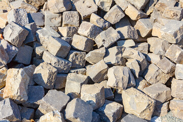 Pile of cobblestones in grey tone