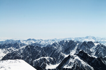 snow covered mountains from the top of Kazbegi