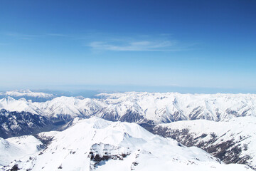 Fototapeta na wymiar snow covered mountains on the way to the top of Kazbegi