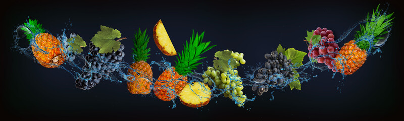 Panorama with fruits in water - juicy grapes, pineapple are full of vitamins and minerals