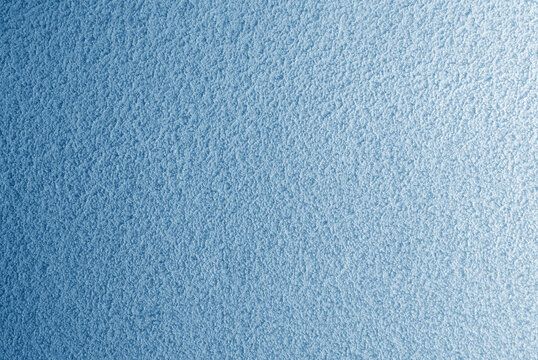 Blue background with seamless pattern with a slight gradient. Blue abstract background.