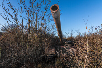 rusty pipe from a abandoned tank in the wilderness