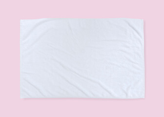 White towel mock up template cotton fabric wiper mockup isolated on pastel pink background with clipping path, flat lay top view