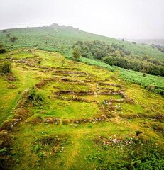 A view of Hound Tor in Dartmoor National Park is a vast moorland in the county of Devon, in southwest England © Alexey Fedorenko